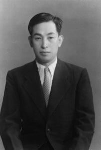 [12] Passport Photo (1954)